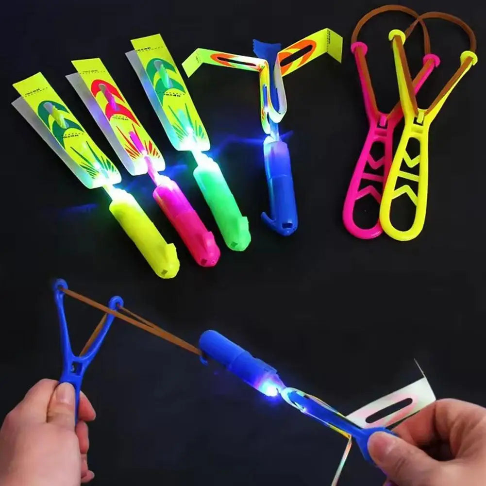 5/10/20Pcs Slingshots Rocket Launcher Rocket Slingshot Flying Toys with LED Lights Flying Toys Luminous Slingshot Toys for Kids
