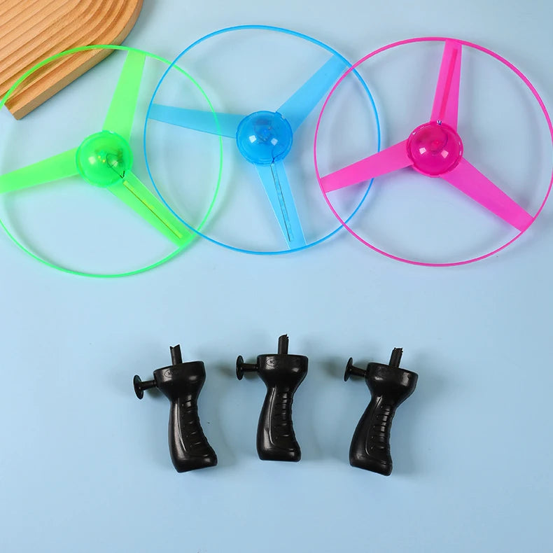 1PCS Luminous Flying Disc Propeller Toys LED Lighting Pull String Flying UFO Toy Spinning Top Outdoor Game Sports Toy Gift