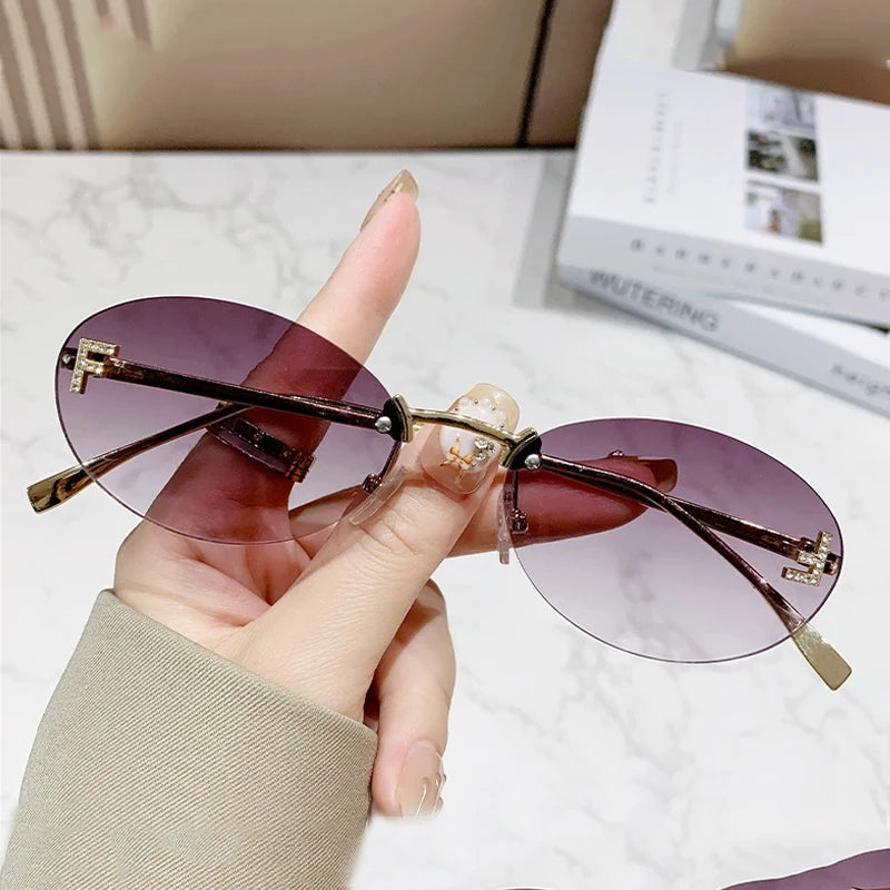 Fashion Rimless Oval UV400 Diamond Sunglasses for Women